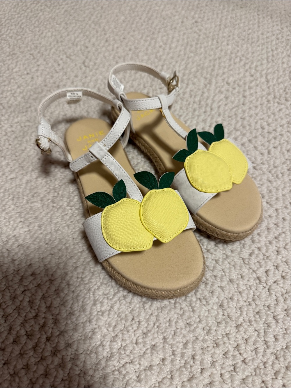 Nine & Co. White T‑Strap Sandals with Yellow Lemon Appliqués